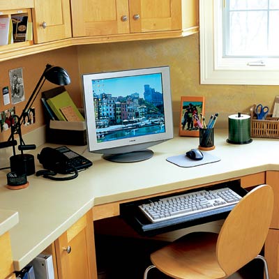 work station desk with computer in laundry room