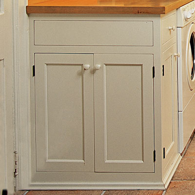 custom cabinets in combination mud room and laundry room
