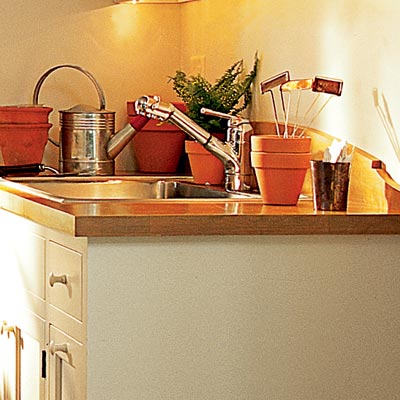 planting center with sink in laundry room mud room
