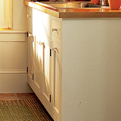 pull out bins in laundry room mud room
