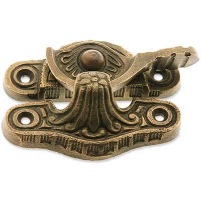 a decorative solid bronze embossed sash lock