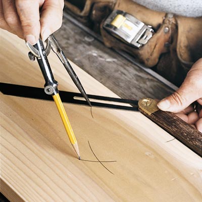 man using sliding t-bevel to bisect an angle
