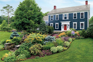 diversity of flowers planted together in a dramatic entry garden