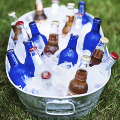 bucket of beer bottles