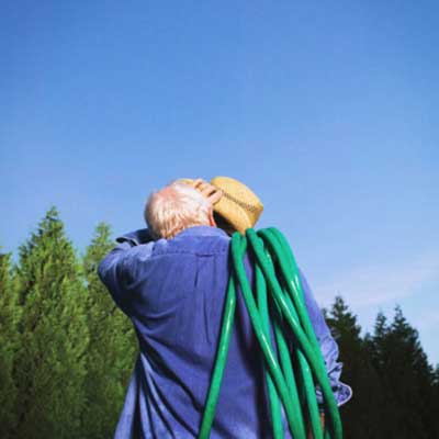 older man sweating in hot sun