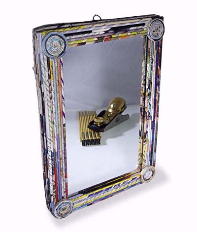 mirror framed in recycled magazines