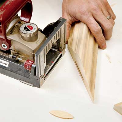biscuits and wood glue used to join parts for the ceiling medallion restoration during the toh tv los angeles house project remodel