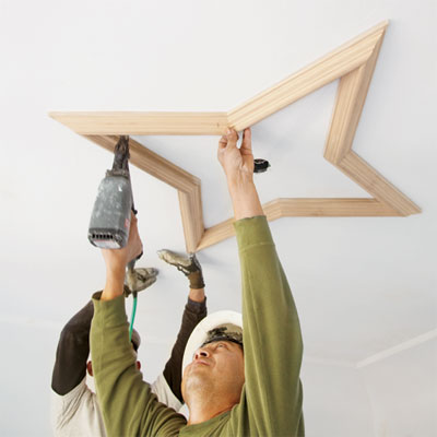 restored ceiling medallion is installed during the toh tv los angeles house project remodel