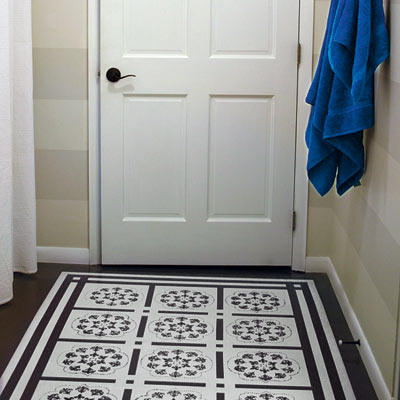 bathroom with painted wood floor