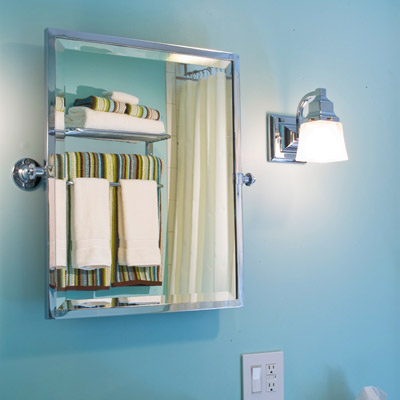 remodeled bathroom sink and beveled mirror
