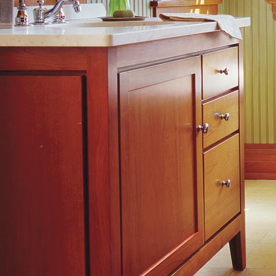 craftsman style bathroom with warm wood accents