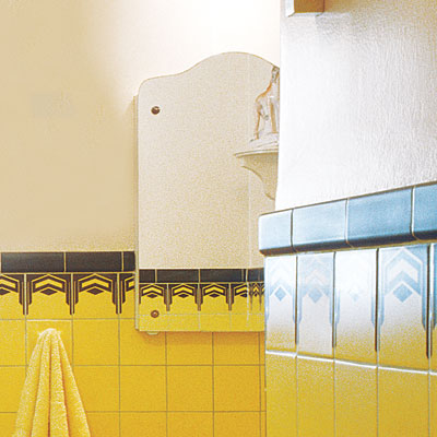 art deco style bathroom with reflective finishes