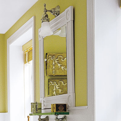 bathroom with framed mirror