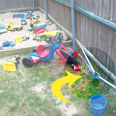 exposed junction box running though kids play area in yard