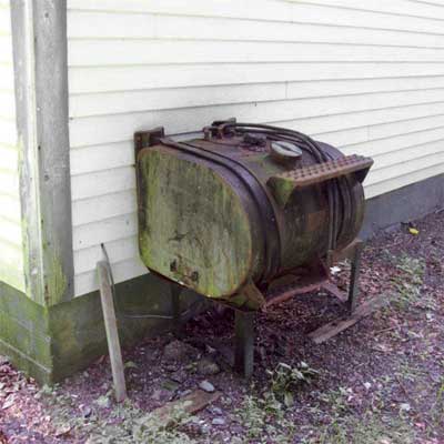 truck tank converted to an exterior oil tank for a garage furnace