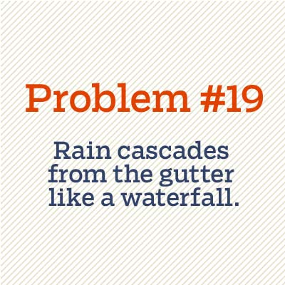 rain pouring out of gutter
