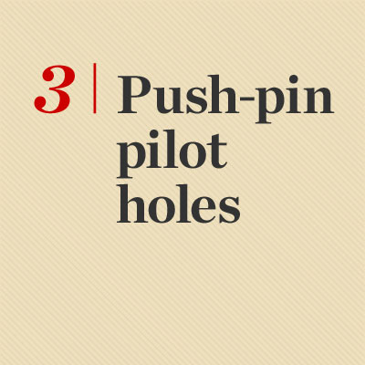 making pilot holes with push pins reader tip to save time and money