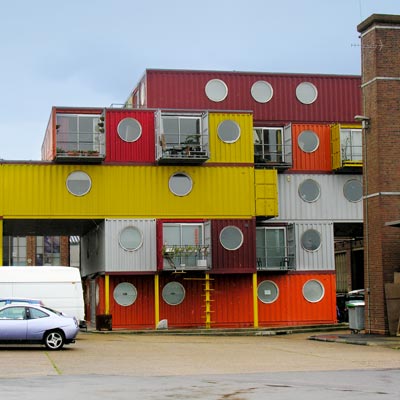 a housing complex built from recycled freight shipping containers