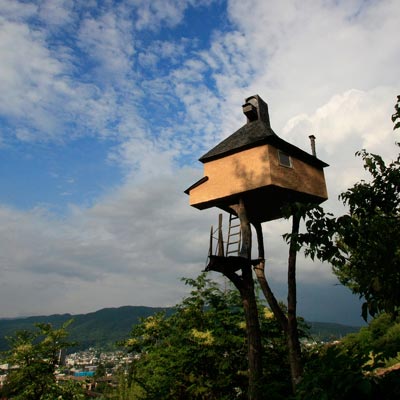 a traditional Japanese teahouse on stilts