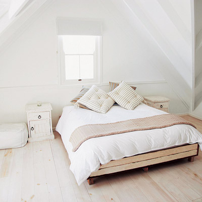All-white attic bedroom