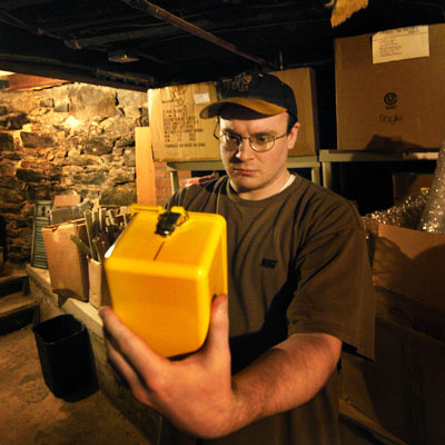 A Man surveying and home basement