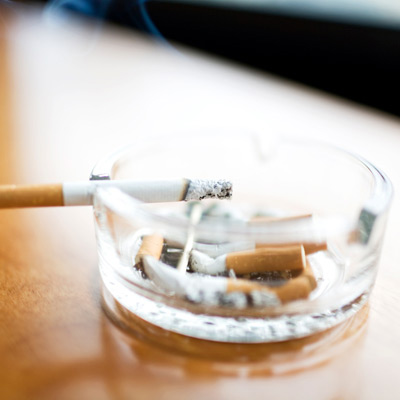 Cigarette butts and ashtray 