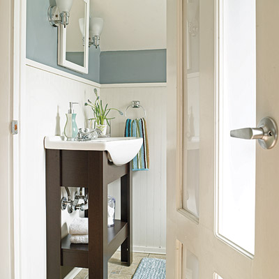 remodeled bathroom with glass paneled door