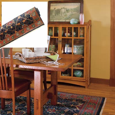 a Persian carpet on a dining room floor