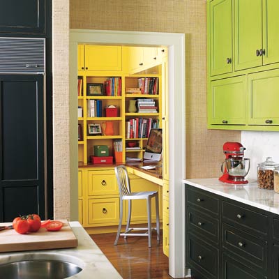 kitchen with green cabinets and yellow working space