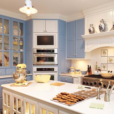kitchen with periwinkle and white painted cabinets