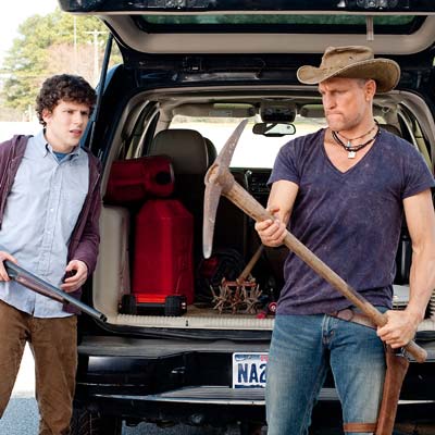 zombieland scene with woody harrelson using pick ax as weapon