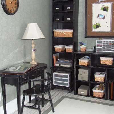 Home office with painted wall and added desk  