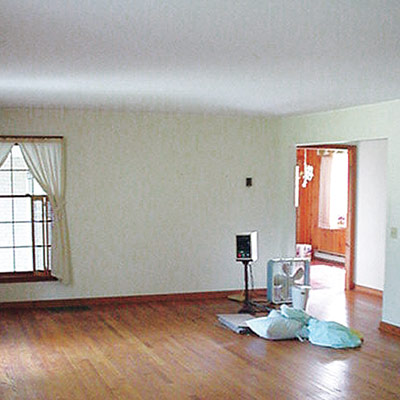 Empty living room before remodel