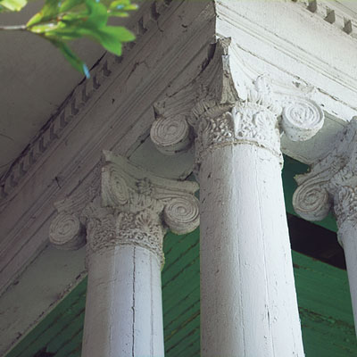 Exterior porch columns of this Mississippi Queen Anne
