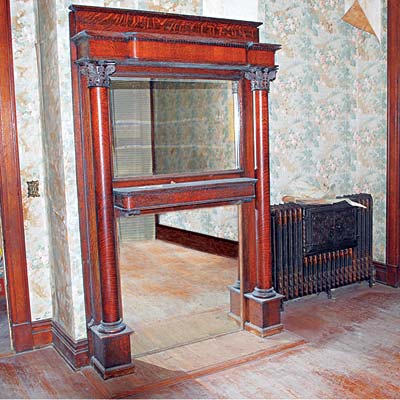 Oak mantel in this Mississippi Queen Anne