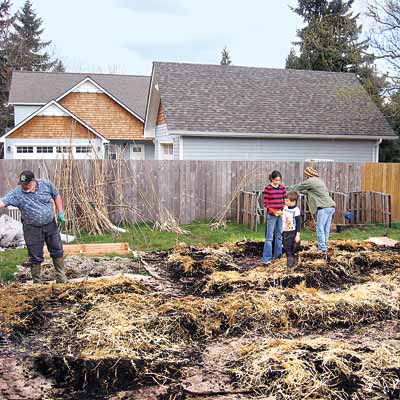 volunteers gardening in community garden