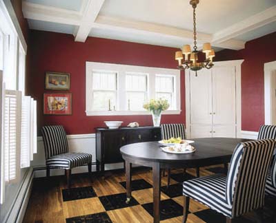 dining room with coffered ceiling and checkered wood floors