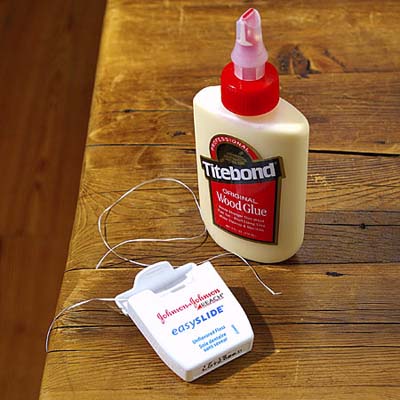 dental floss for working glue into cracks in woodwork