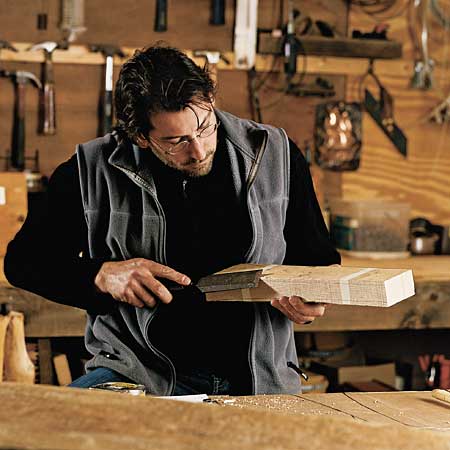 David Strong salvaging wood from demolition