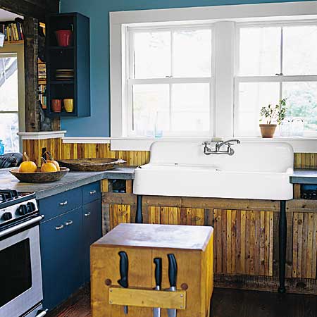kitchen with cast iron sink and salvaged woods