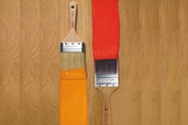 paintbrushes dipped in paint