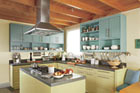green kitchen with open shelving