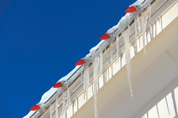 roof edge with string lights and icicles 