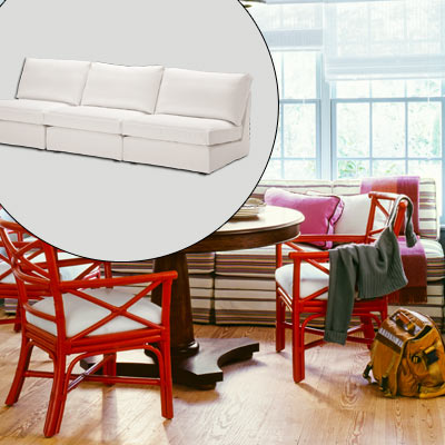 armless white sofa 