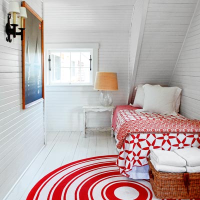 cottage style bedroom with horizontal wood planks on walls 