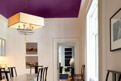 dining room with rich purple painted ceiling