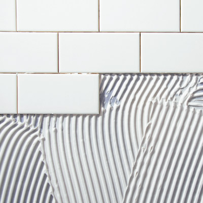 white ceramic subway tile with grout 