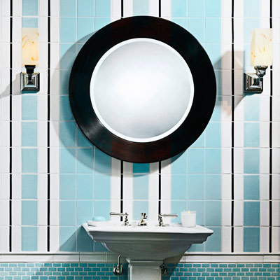 powder room with light blue, white and black vertical subway tile pattern 