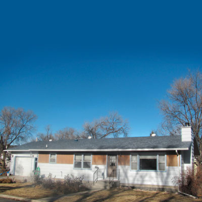 a ranch-style cottage before the Photoshop remodel
