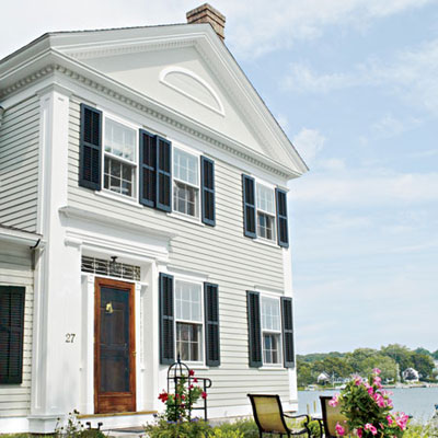 gabled front view of a greek revival home